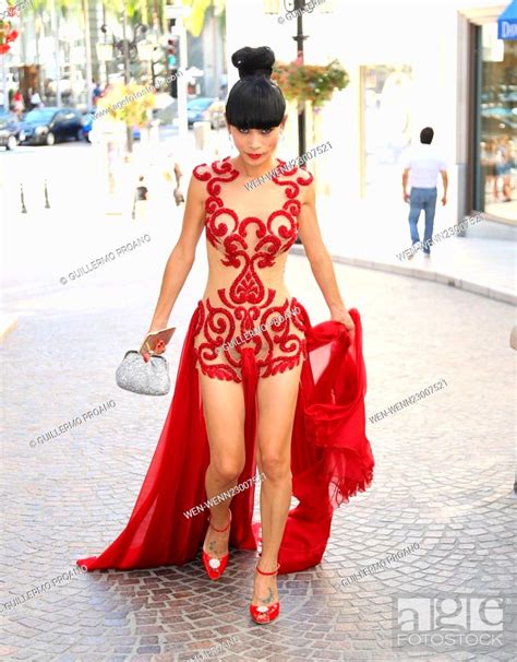 Bai Ling Poses On The Streets Of Beverly Hills In A Red And Nude Sheer