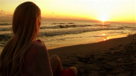 Young Woman On Beach Watching Sunset Stock Video Footage 0020 Sbv 300626751 Storyblocks