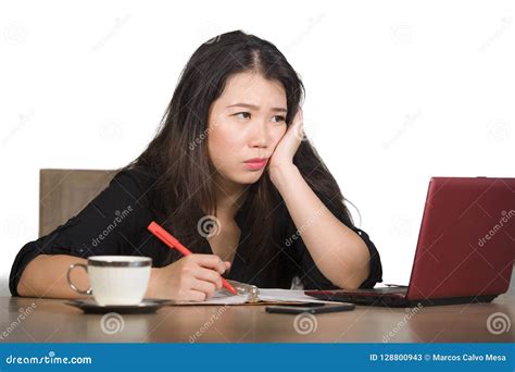 Beautiful Sad And Depressed Asian Chinese Business Woman Working In