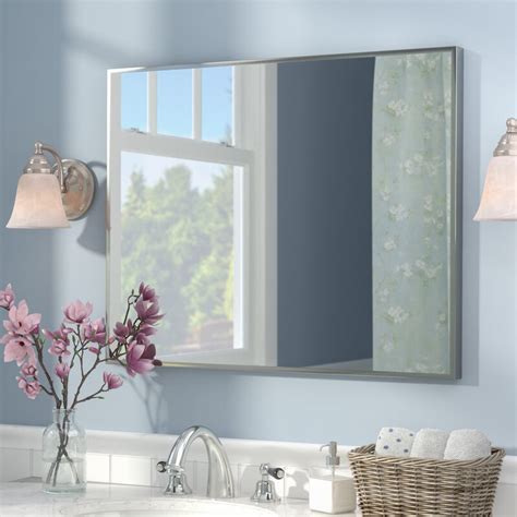 A sleek, contemporary design, this rounded rectangular mirror is ideal over a bathroom vanity but can also serve as an accent piece in an entryway, bedroom, or. Newland Bathroom/Vanity Mirror & Reviews | Birch Lane