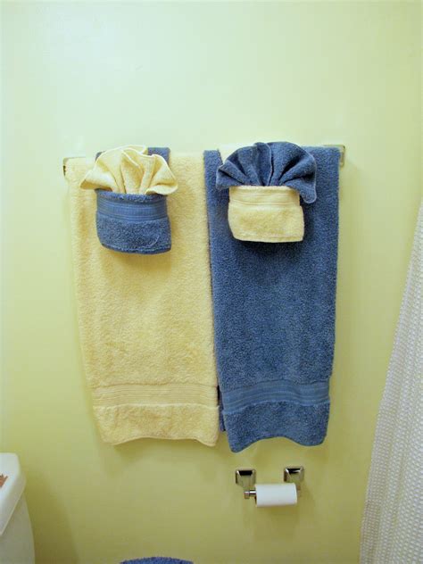 How To Hang Decorative Towels In The Bathroom Artcomcrea