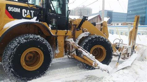 Cat 950m Wheel Loader Plowing Snow With A Craig Wing Assembly Snow Plow