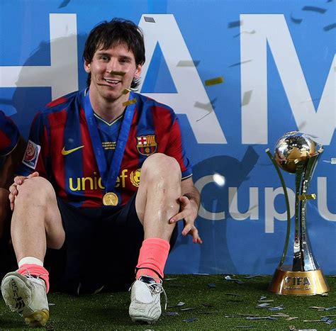 Barcelonas Argentine Striker Lionel Messi Sits Next To The 2009 Fifa