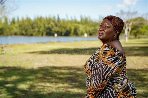 Image Of A Plus Size Model Bbw Posing Outdoors In The Park Stock Image