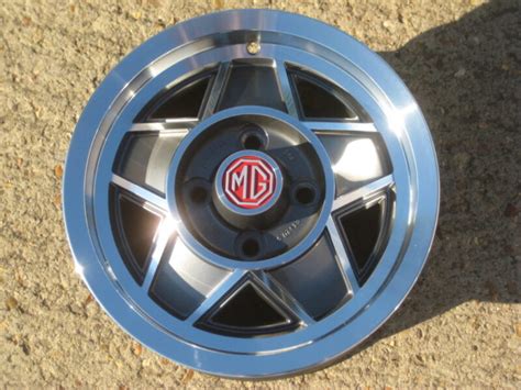 Mgb Gt And Roadster Set Of 4 Le Grey With Polished Rim Wheels Limited Edition
