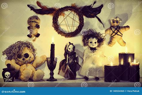 Voodoo Ritual With Scary Dolls Black Candle And Pentagram With