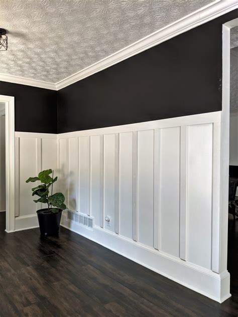 Modern Entryway Black And White Board And Batten Wall Simply Aligned