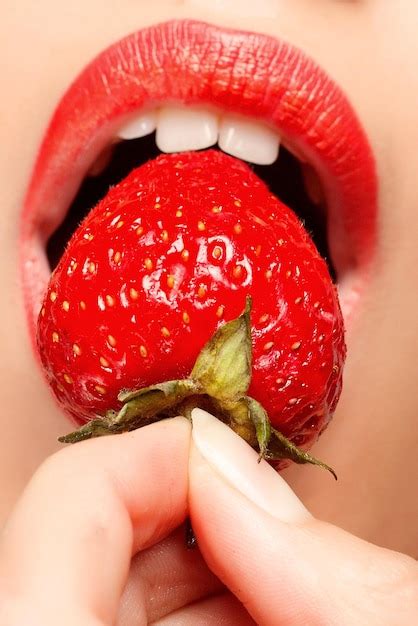 Premium Photo Sexy Woman Eating Strawberry
