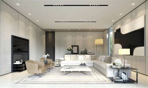 A Modern Living Room With White Furniture And Large Windows