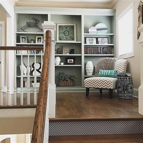 Stick to photo frames and artwork with a slim profile so that you aren't knocking into them while walking up and down the stairway. Pin by Sarah Baker on Top of stairs in 2020 | Stair ...