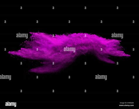 Freeze Motion Of Pink Dust Explosion Isolated On Black Stock Photo Alamy