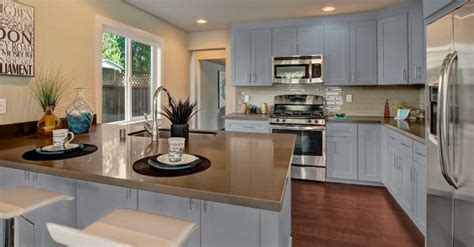 Our company's name is j&a kitchen cabinet. J&K Cabinetry : Castle Grey Maple - Royal Kitchen and Flooring