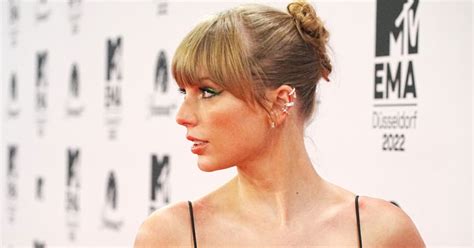 Taylor Swift Poses In Shimmery Sheer Dress On Mtv Emas Red Carpet