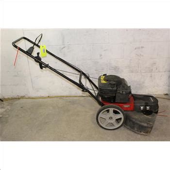 When off season, you want to check underneath your rotary lawn mower and clean off the debris. Jonesred String Lawn mower | Property Room