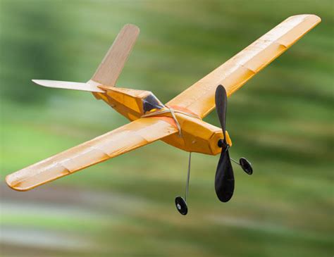 free flight balsa wood model airplane with rubber powered propeller