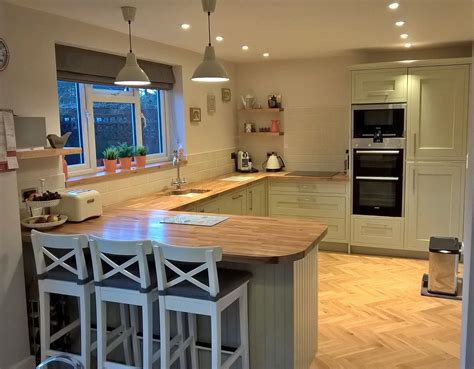 This henley kitchen is hand painted with sage green. Multiwood Baystone kitchen from 3d kitchens in Sage green ...