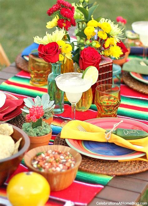 Scatter white votives around the table, and serve the meal on white dinner plates. Mexican Party Ideas and fiesta themed tablescape ...