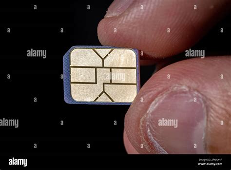 Mobile Phone Sim Card In One Hand Stock Photo Alamy