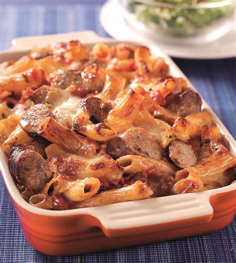 This Hearty Dinner Of Cheesy Pasta And Sliced Sausage In A Rich