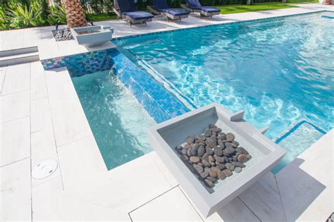 New Infinity Edge Pool With Custom Spa Sunshelf And Water Bowls In