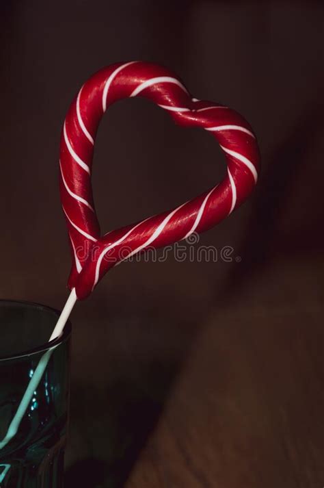 Red Sweet Heart Lollipop On Grey Background Stock Photo Image Of