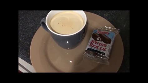 First you shake the milk in a jar to create foam, then you pour the milk into the jar: how to make frothy coffee using frother mix and espresso ...