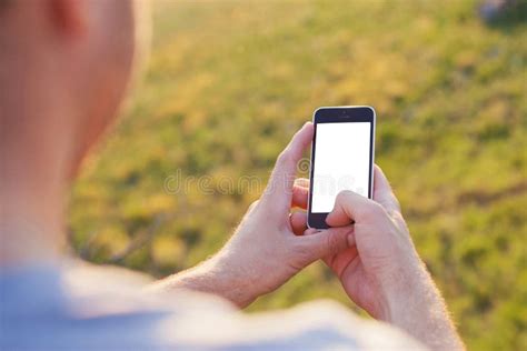 Men S Hands Hold The Smartphone With A White Screen Stock Image Image