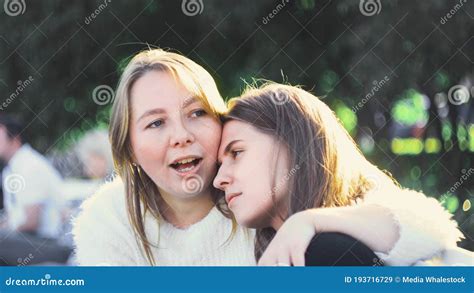 Lesbian Couple Relax In Park In Sunny Day Media Stock Image Image Of Park Female 193716729