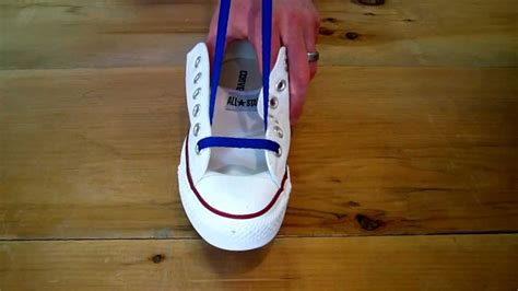 When you tie the knot under the insole, put it towards the inside arch of your foot so you can't feel it. How to Bar Lace Chuck Taylors - YouTube