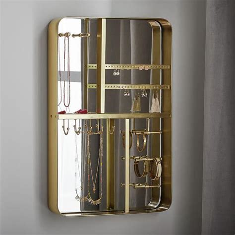 Maybe you would like to learn more about one of these? Brass Framed Mirrored Wall Mount Jewelry Organizer