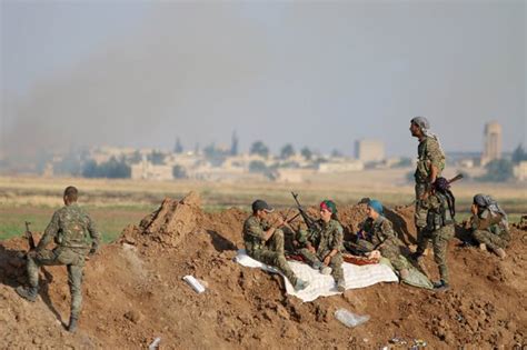 Kurds And Syrian Rebels Storm Isis Held Border Town The New York Times