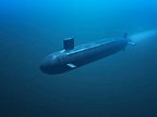 Why do submarines have higher top speed when fully submerged? - Naval ...