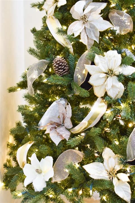 When decorating your christmas tree this year, don't forget to add the ribbon. How to Put Ribbon on a Christmas Tree - Monica Wants It % | Christmas tree ribbon garland ...
