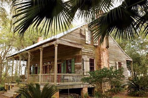 Originally Built In The 1840s This Creole Cottage Sits Between A