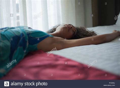 One Woman Lying Arms Out Stock Photos One Woman Lying Arms Out Stock Images Alamy