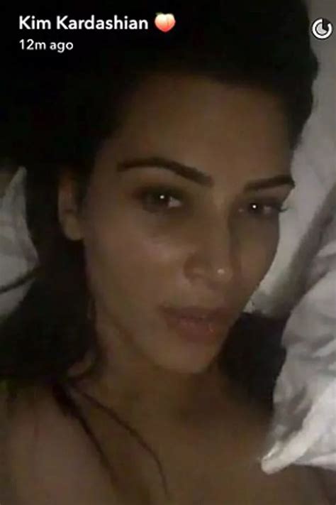 kim kardashian shares intimate video in bed with kanye west as he snores next to her mirror online