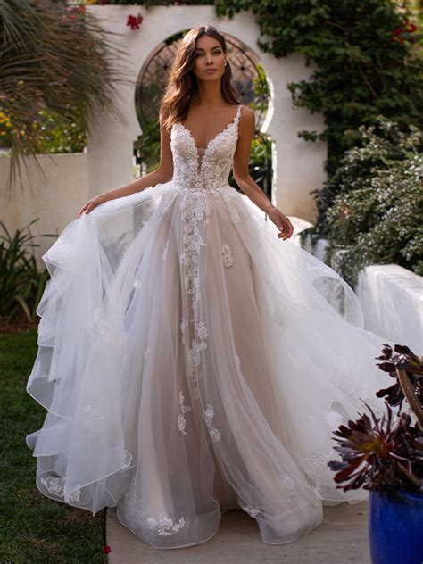 To bring your couture dreams to life, you'll need a talented wedding dress designer. Wedding Dress Designers | Moonlight Bridal