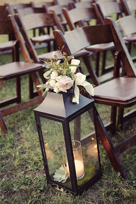 Decorate The Top Of Lanterns With Flowers Wedding Aisle Decorations