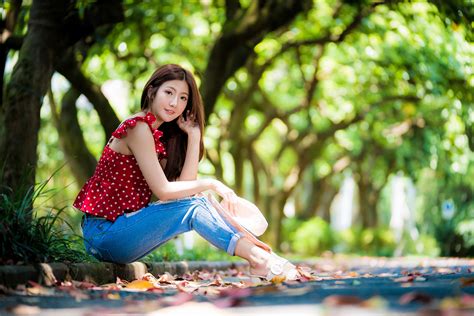 Asian Model Women Long Hair Brunette Depth Of Field Sitting Trees Jeans