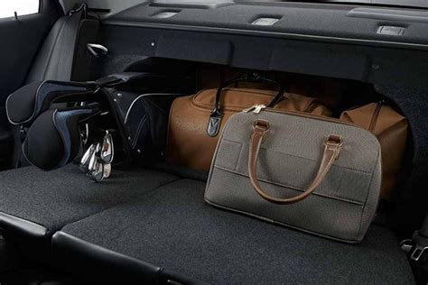 How many suitcases fit in a Chevy Malibu? 2