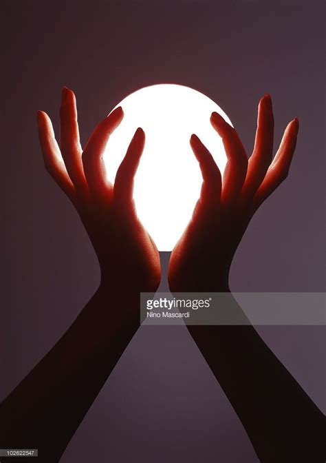 Female Hands Holding A Ball Of Light Picture Id102622547 722×1024