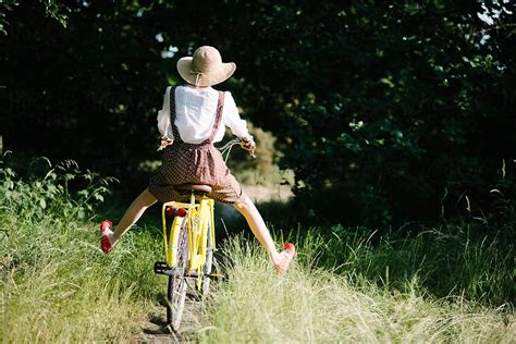 Girl Having Fun While Riding Bicycle In The Country Del Colaborador De Stocksy Kirstin Mckee