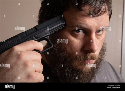 Aiming Gun At Head Hi Res Stock Photography And Images Alamy