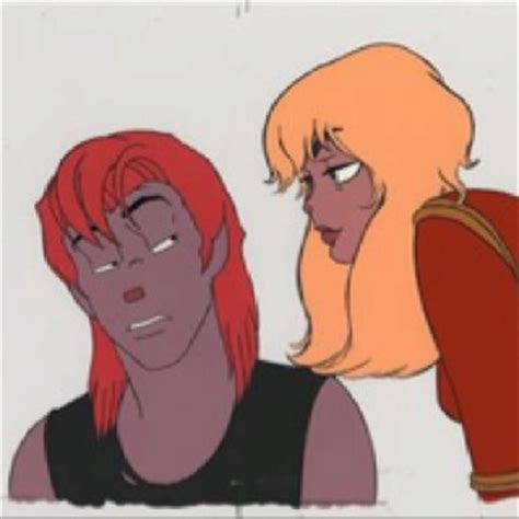 Two Cartoon Characters One With Red Hair And The Other Blonde Staring