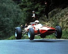 Ludovico Scarfiotti jumping his Ferrari at the 1966 German Grand Prix ...