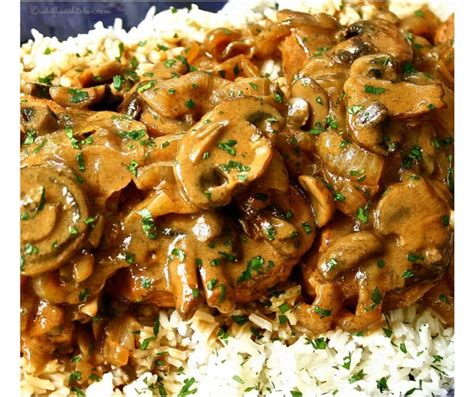 They call pork the other white meat for good reason. Fall Apart Tender Pork Chops & Gravy Over Rice - Wildflour ...