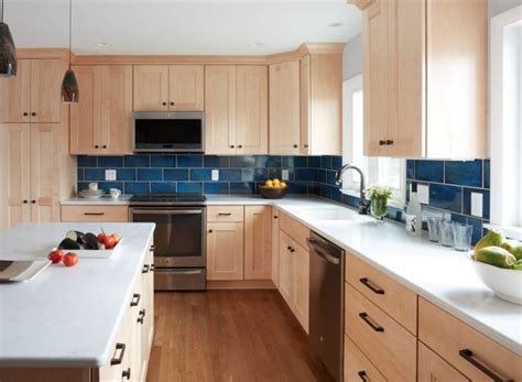 The whole kitchen divides into three part: natural wood kitchen blue backsplash - Google Search ...