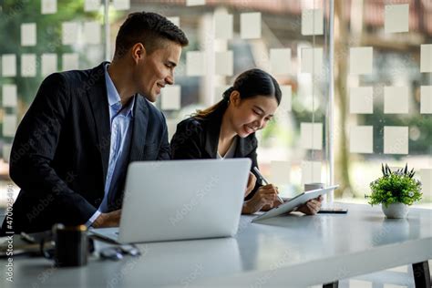 Team Of Business People Working Together In The Meeting Room Office