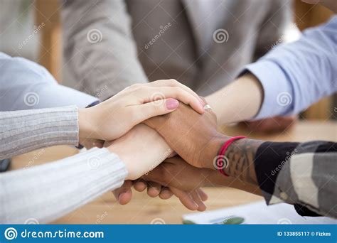 Close Up Of Diverse People Join Hands In Stack Together Stock Image ...