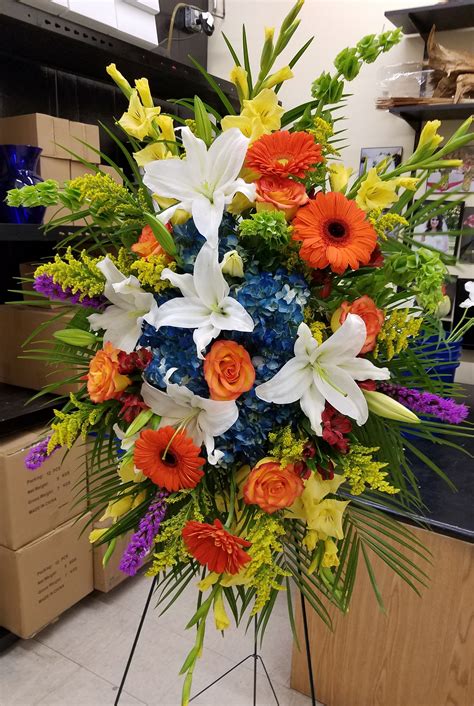 We specialize in all occasions same day flower delivery in plano tx. Rays of Light Standing Spray Plano Florist: Z's Florist ...
